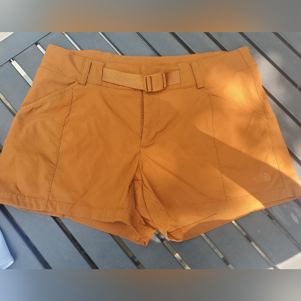 The North Face stretchy shorts size 6 women in dark orange